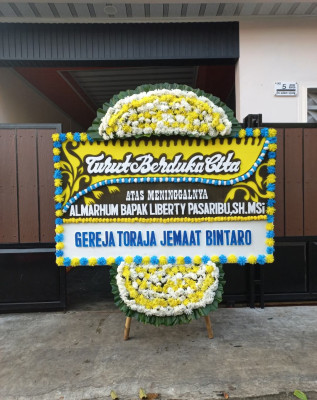 Papan Bunga Duka di Airpura